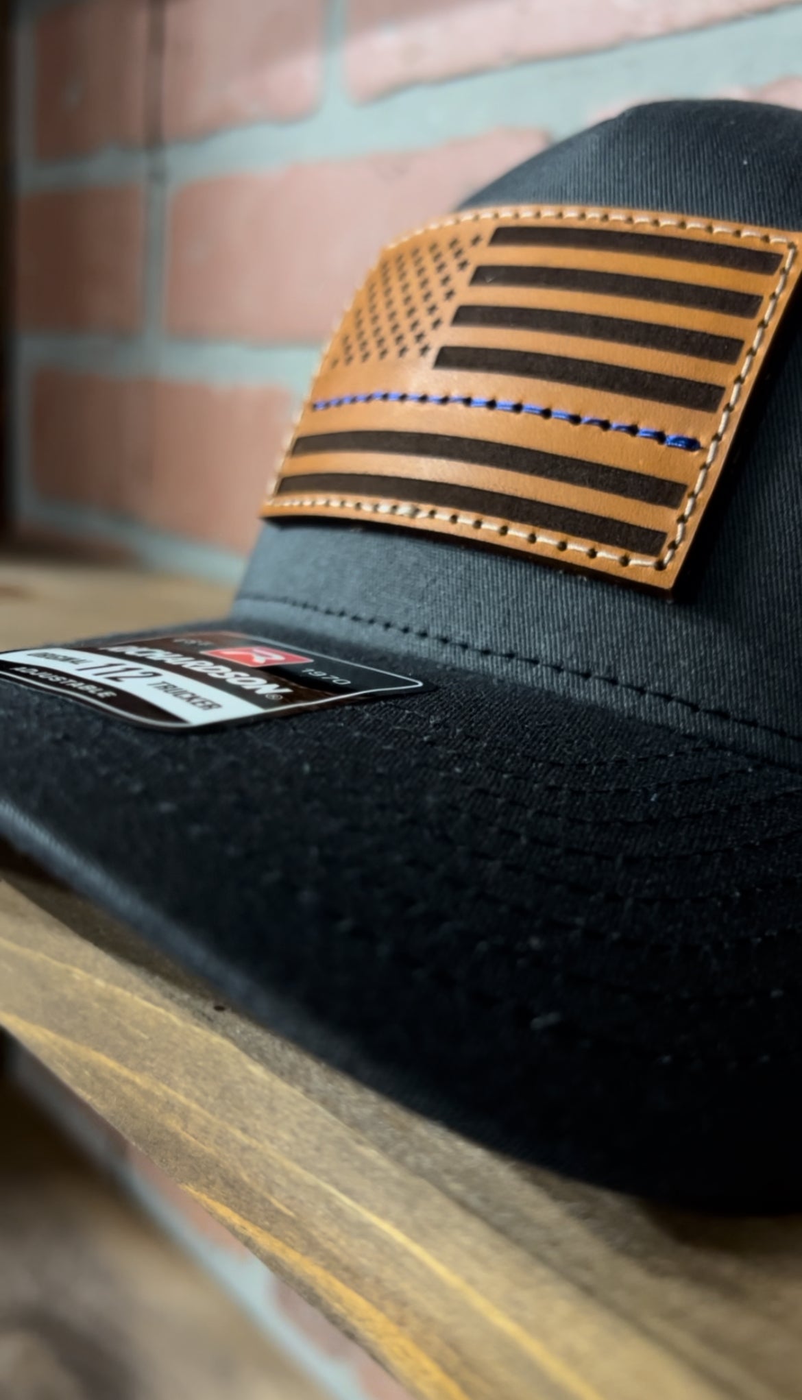 Blue Line American Flag Leather Patch Trucker Hat